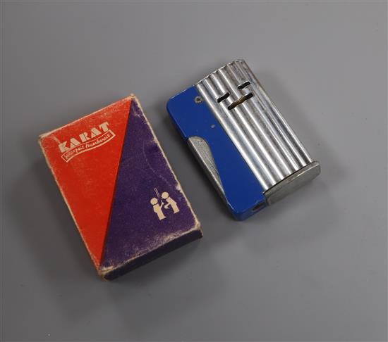 A World War II Karat lighter, boxed